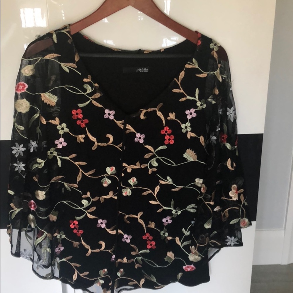 Beautifully  embroidered black top.